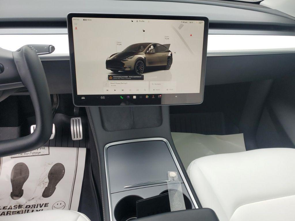 used 2023 Tesla Model Y car, priced at $31,128