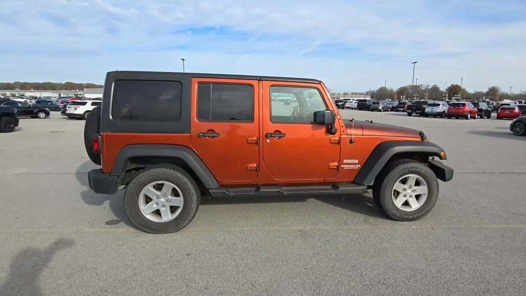 used 2014 Jeep Wrangler Unlimited car, priced at $18,148