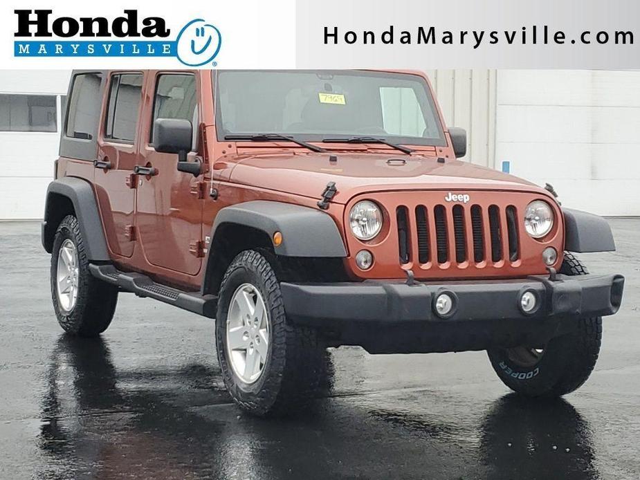 used 2014 Jeep Wrangler Unlimited car, priced at $15,000