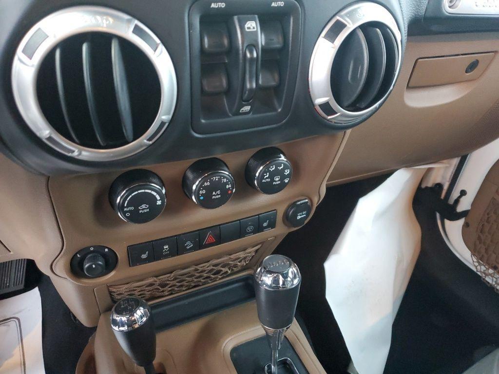 used 2015 Jeep Wrangler Unlimited car, priced at $16,384