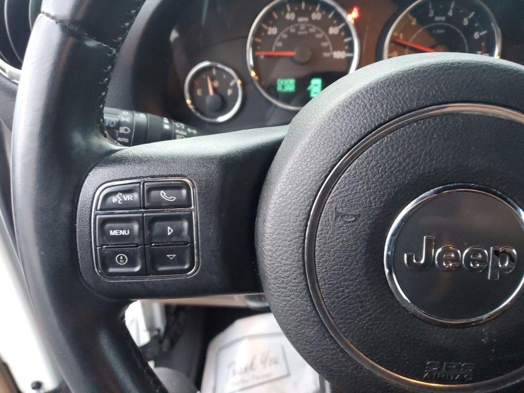 used 2015 Jeep Wrangler Unlimited car, priced at $16,384