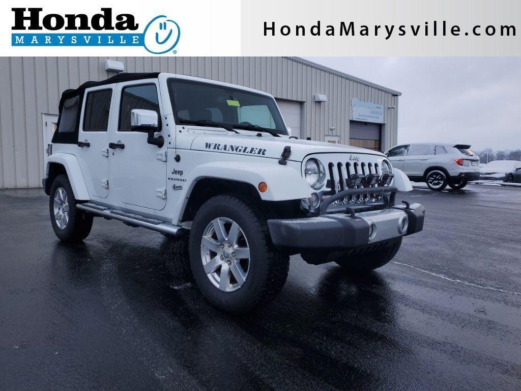 used 2015 Jeep Wrangler Unlimited car, priced at $16,384