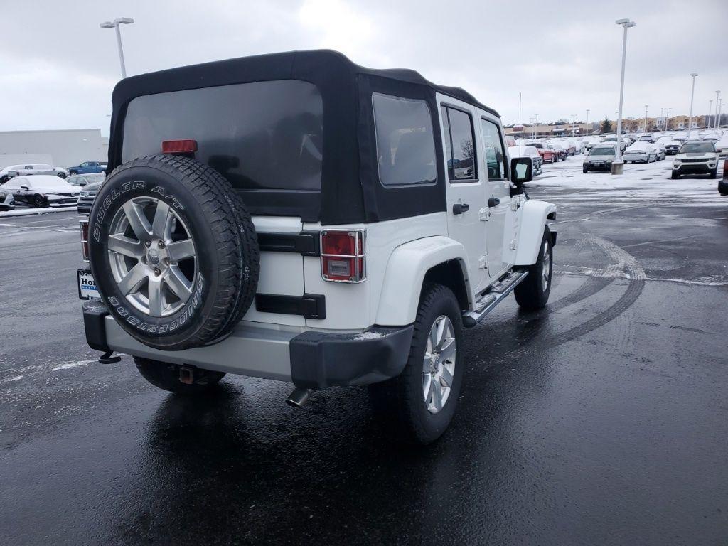 used 2015 Jeep Wrangler Unlimited car, priced at $16,384