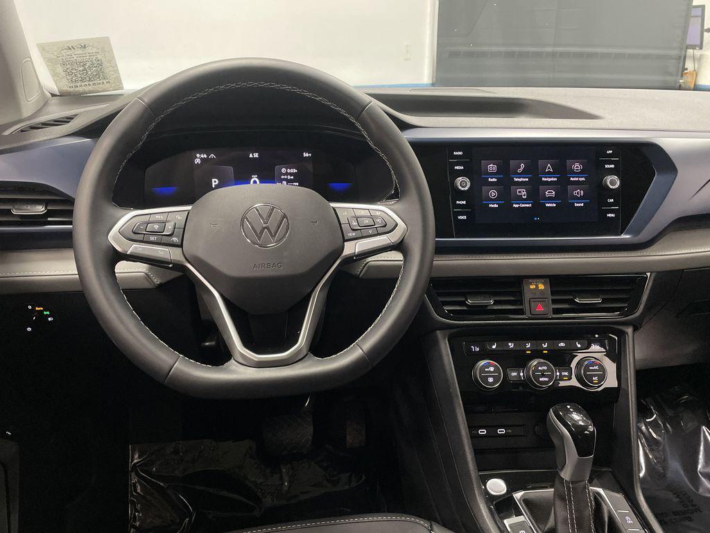 used 2024 Volkswagen Taos car, priced at $22,872