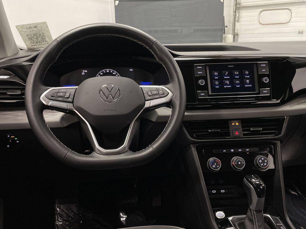 used 2023 Volkswagen Taos car, priced at $16,795