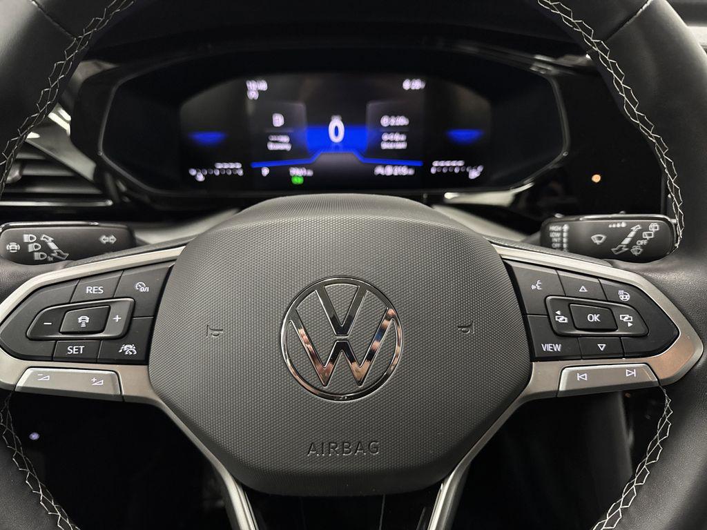 used 2024 Volkswagen Taos car, priced at $19,570
