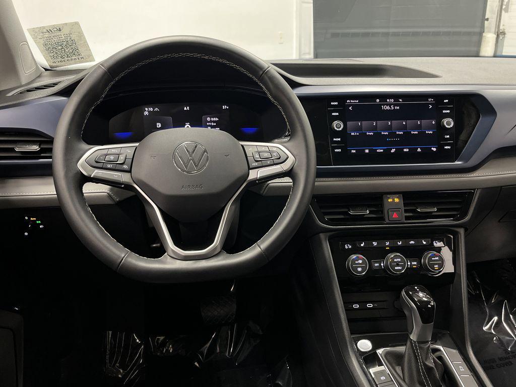 used 2024 Volkswagen Taos car, priced at $22,602