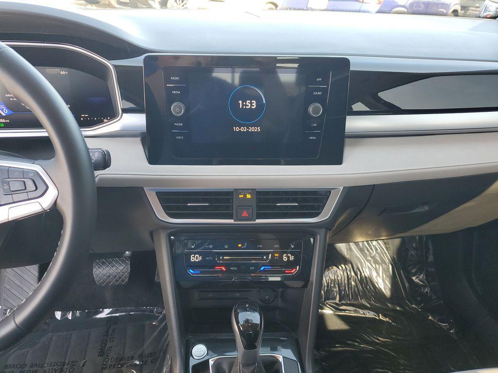 used 2025 Volkswagen Taos car, priced at $27,404