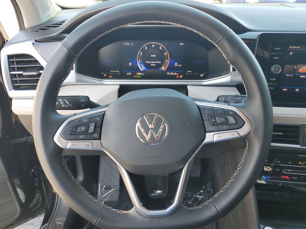 used 2025 Volkswagen Taos car, priced at $27,404