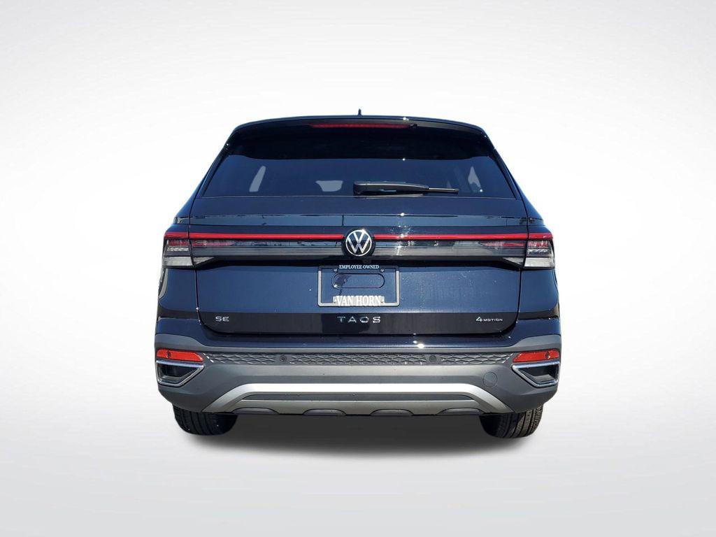 used 2025 Volkswagen Taos car, priced at $27,404