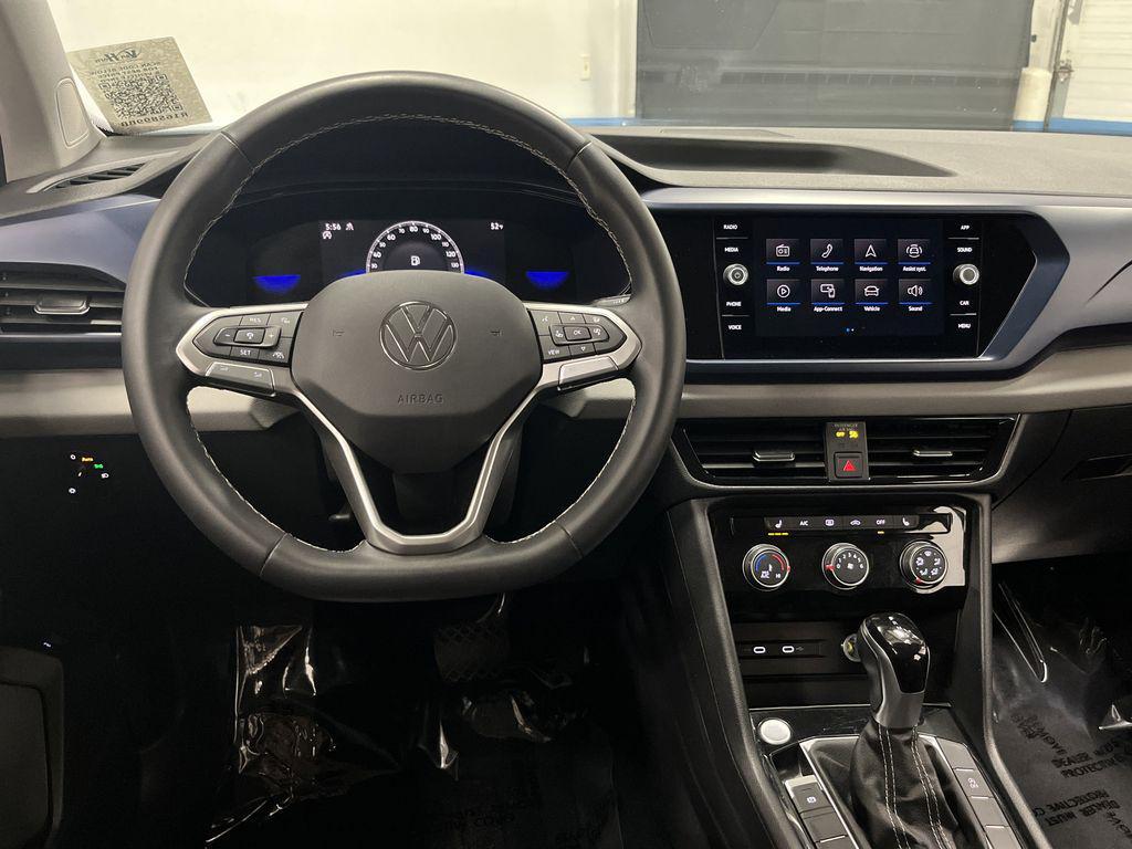used 2023 Volkswagen Taos car, priced at $19,995