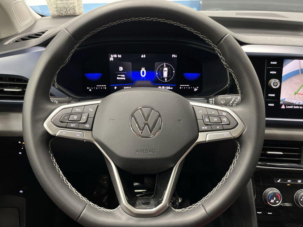used 2023 Volkswagen Taos car, priced at $19,842