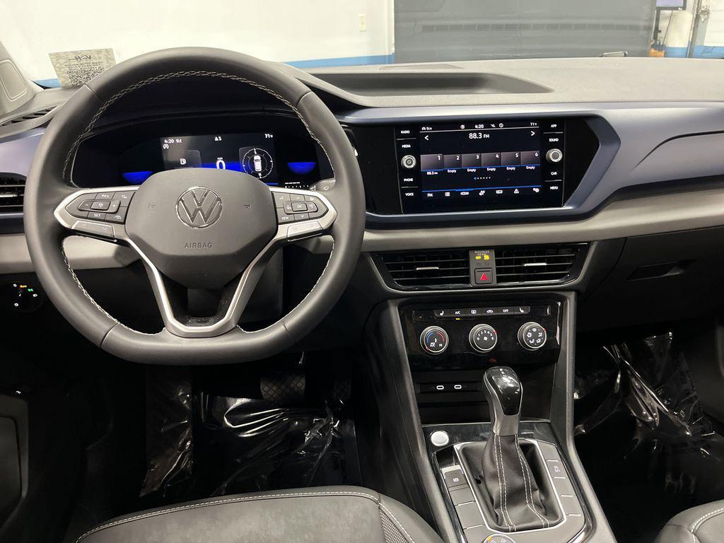 used 2023 Volkswagen Taos car, priced at $19,842