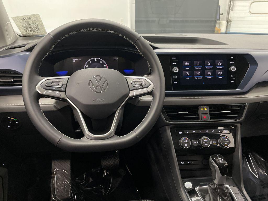used 2024 Volkswagen Taos car, priced at $23,931
