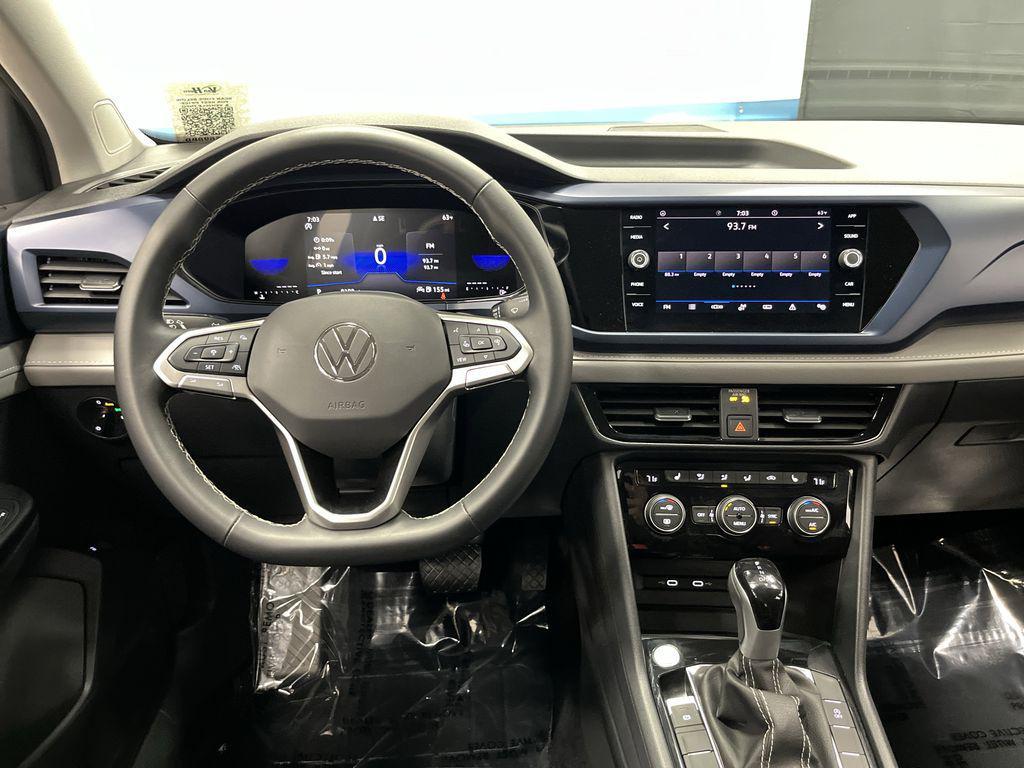 used 2024 Volkswagen Taos car, priced at $19,155