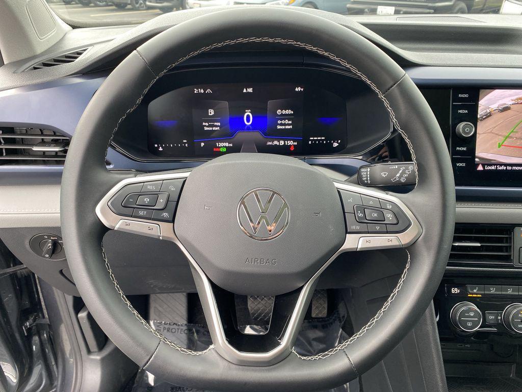 used 2024 Volkswagen Taos car, priced at $22,495