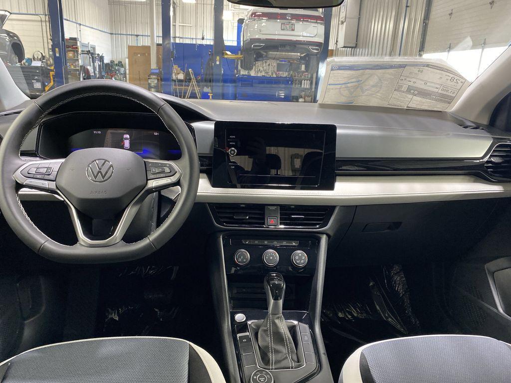 new 2025 Volkswagen Taos car, priced at $25,995