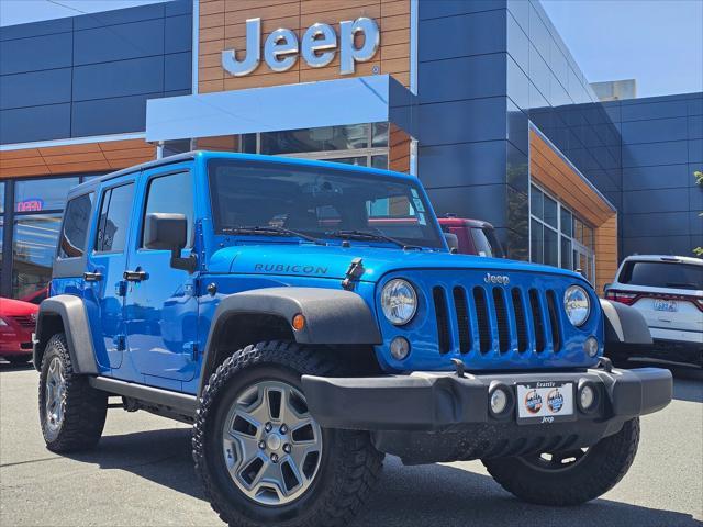 used 2015 Jeep Wrangler Unlimited car, priced at $25,369