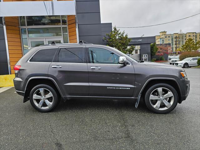 used 2014 Jeep Grand Cherokee car, priced at $14,369