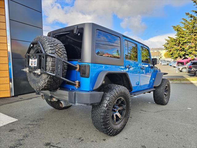 used 2014 Jeep Wrangler Unlimited car, priced at $19,777