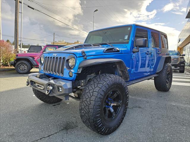 used 2014 Jeep Wrangler Unlimited car, priced at $19,777