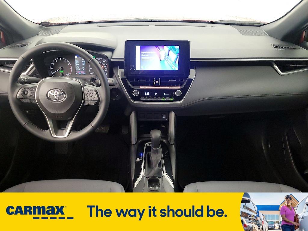 used 2024 Toyota Corolla Cross Hybrid car, priced at $34,998