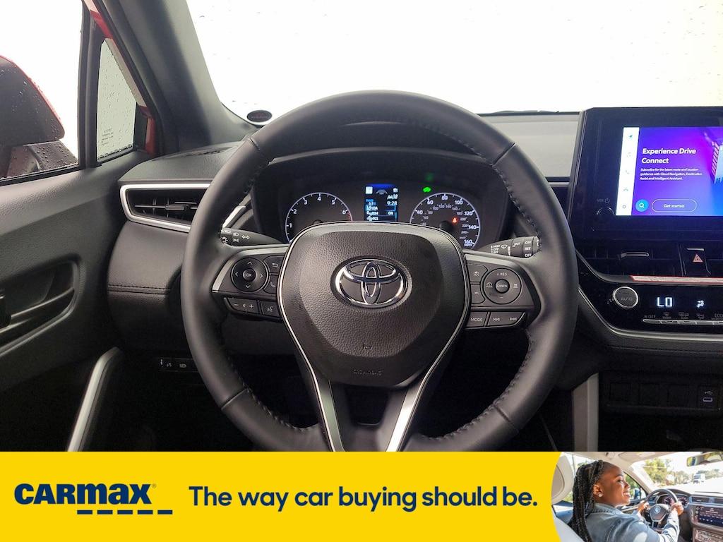 used 2024 Toyota Corolla Cross Hybrid car, priced at $34,998