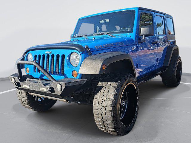 used 2011 Jeep Wrangler Unlimited car, priced at $19,488