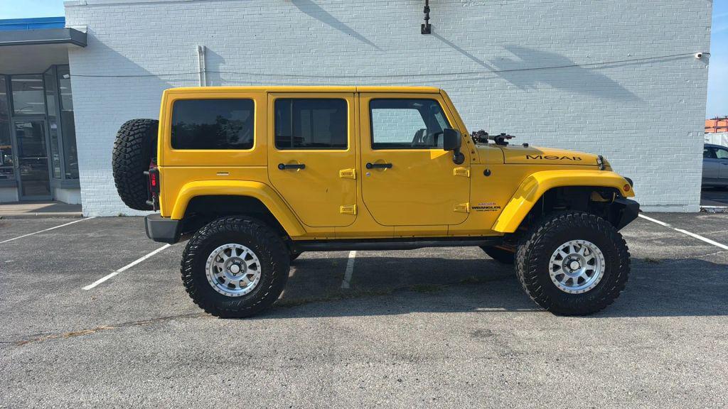 used 2015 Jeep Wrangler Unlimited car, priced at $18,195