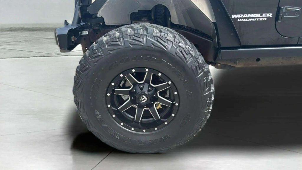 used 2010 Jeep Wrangler Unlimited car, priced at $18,395