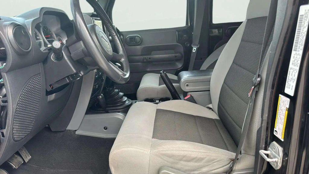 used 2010 Jeep Wrangler Unlimited car, priced at $18,395