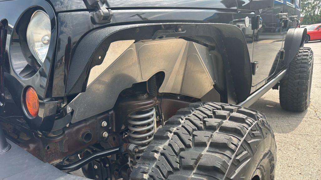used 2010 Jeep Wrangler Unlimited car, priced at $18,995