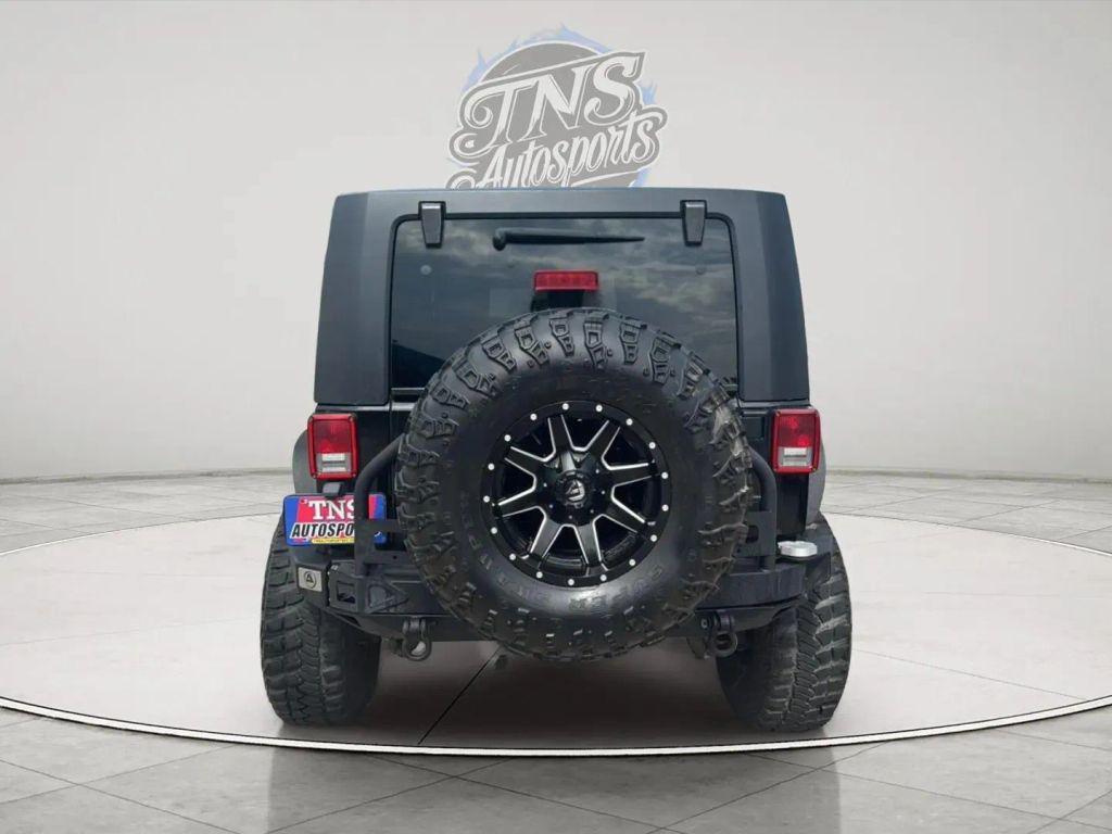 used 2010 Jeep Wrangler Unlimited car, priced at $18,395