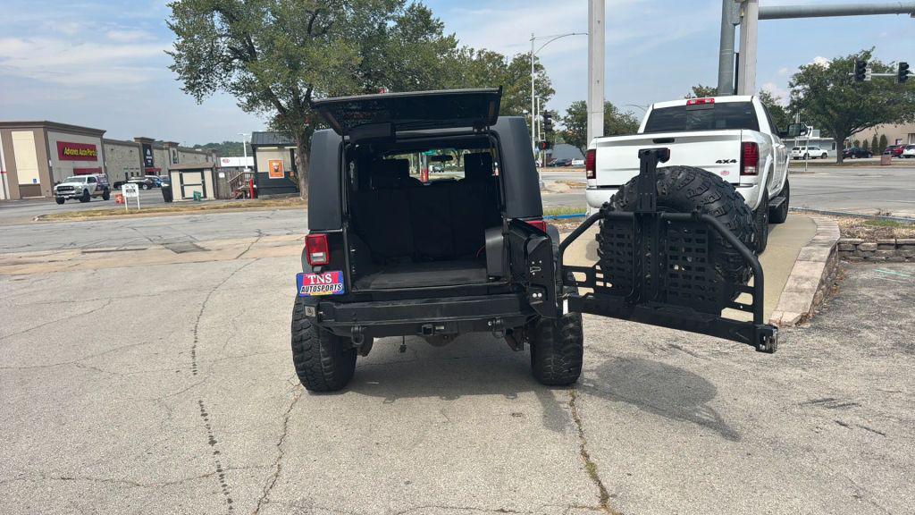 used 2010 Jeep Wrangler Unlimited car, priced at $18,995