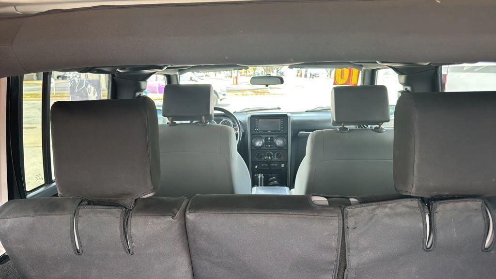 used 2010 Jeep Wrangler Unlimited car, priced at $18,995
