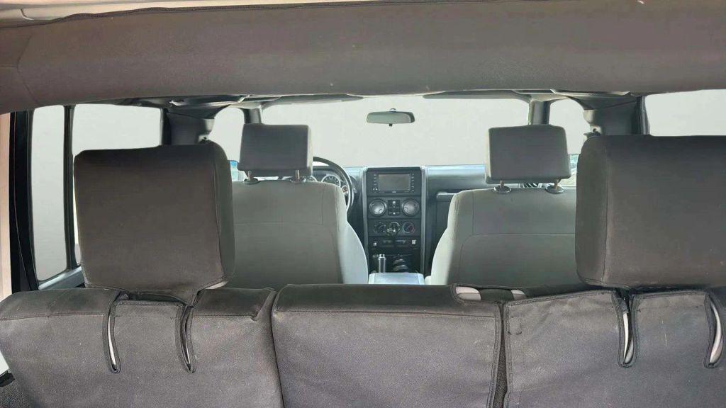 used 2010 Jeep Wrangler Unlimited car, priced at $18,395