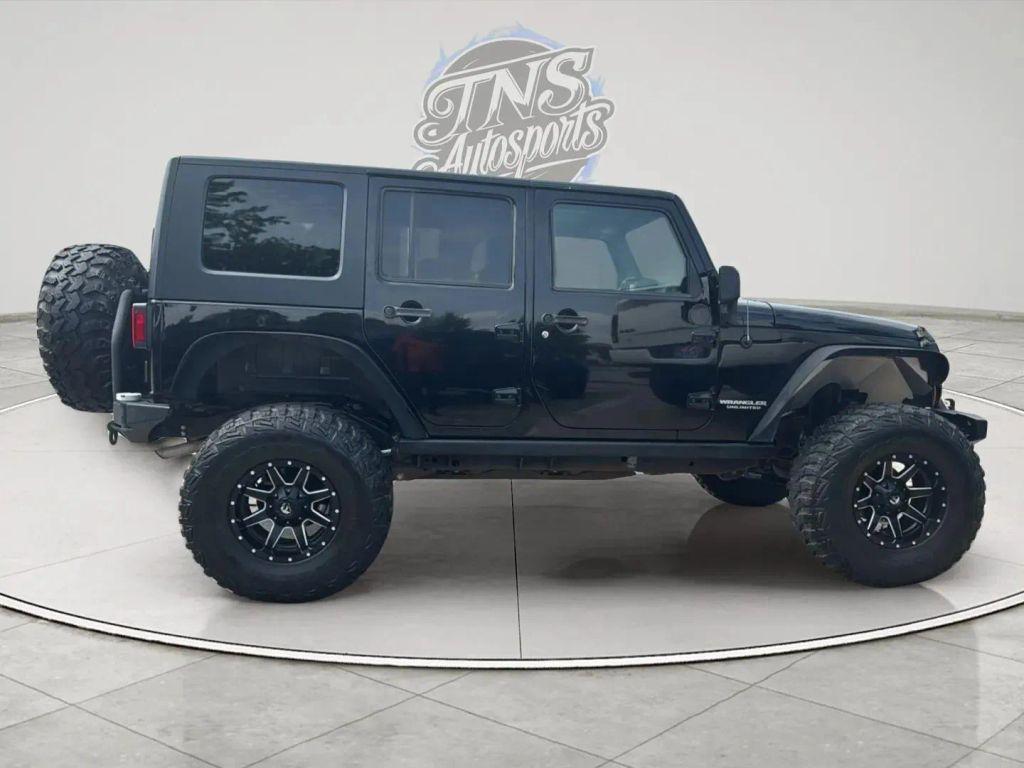 used 2010 Jeep Wrangler Unlimited car, priced at $18,395