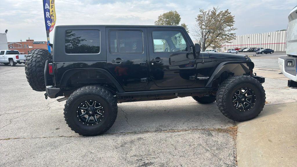 used 2010 Jeep Wrangler Unlimited car, priced at $18,995