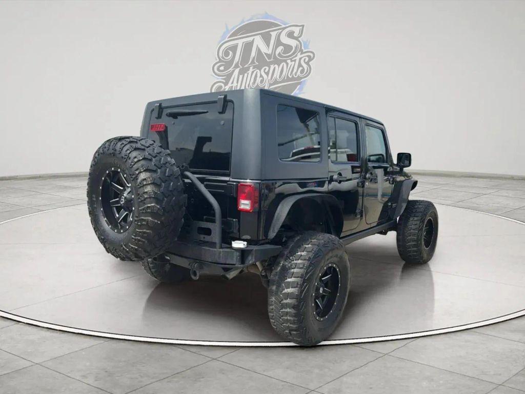 used 2010 Jeep Wrangler Unlimited car, priced at $18,395