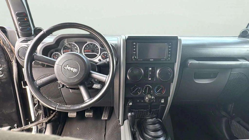 used 2010 Jeep Wrangler Unlimited car, priced at $18,395