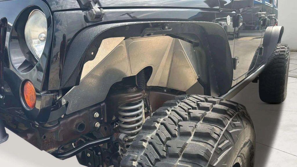 used 2010 Jeep Wrangler Unlimited car, priced at $18,395