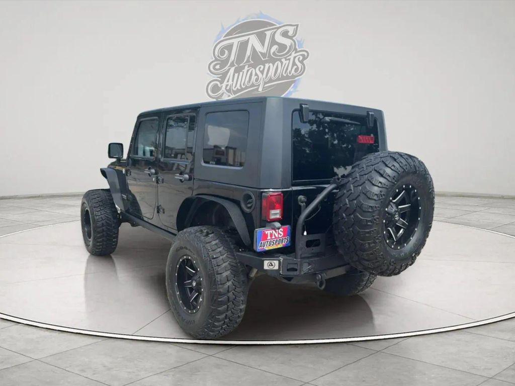 used 2010 Jeep Wrangler Unlimited car, priced at $18,395