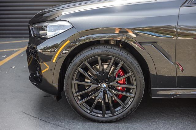 used 2022 BMW X6 car, priced at $56,998
