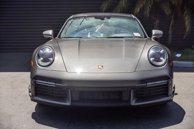 used 2024 Porsche 911 car, priced at $295,998