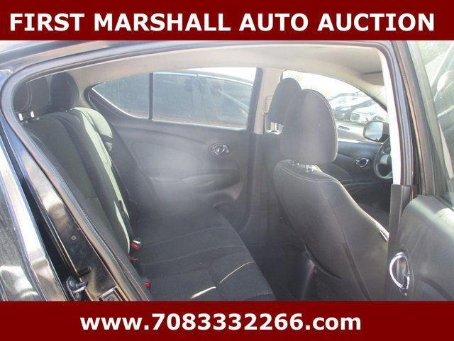used 2014 Nissan Versa car, priced at $1,900