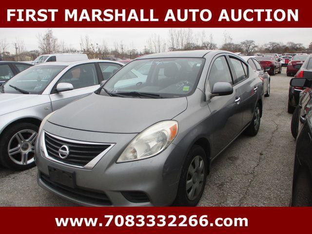 used 2014 Nissan Versa car, priced at $1,800