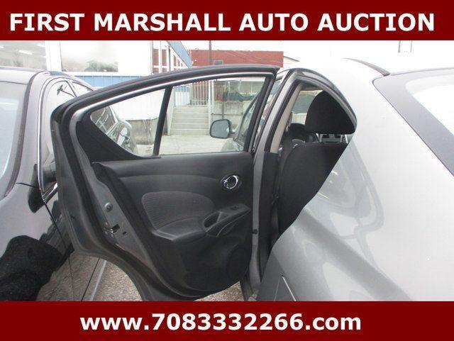 used 2014 Nissan Versa car, priced at $1,800