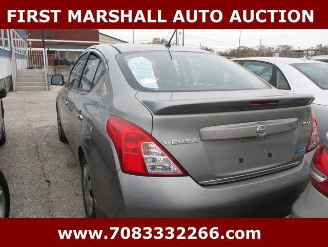 used 2014 Nissan Versa car, priced at $1,800