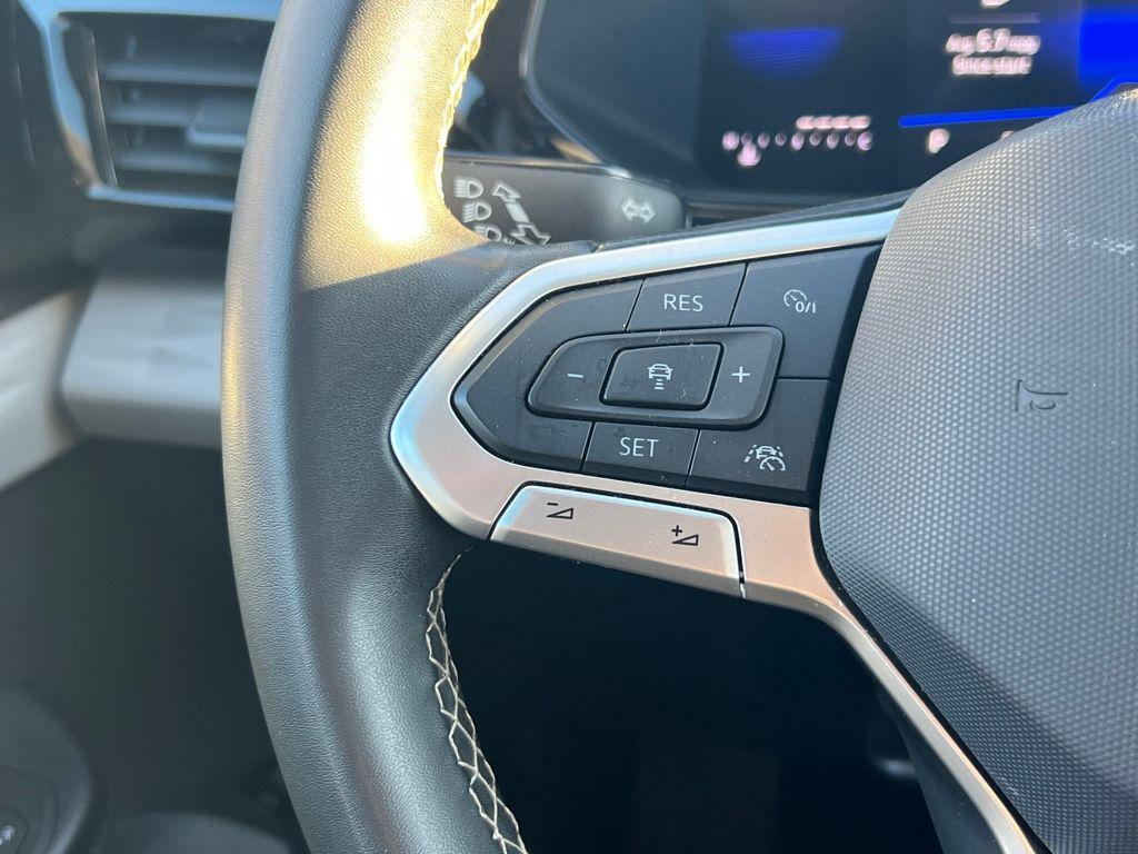 used 2024 Volkswagen Taos car, priced at $21,595