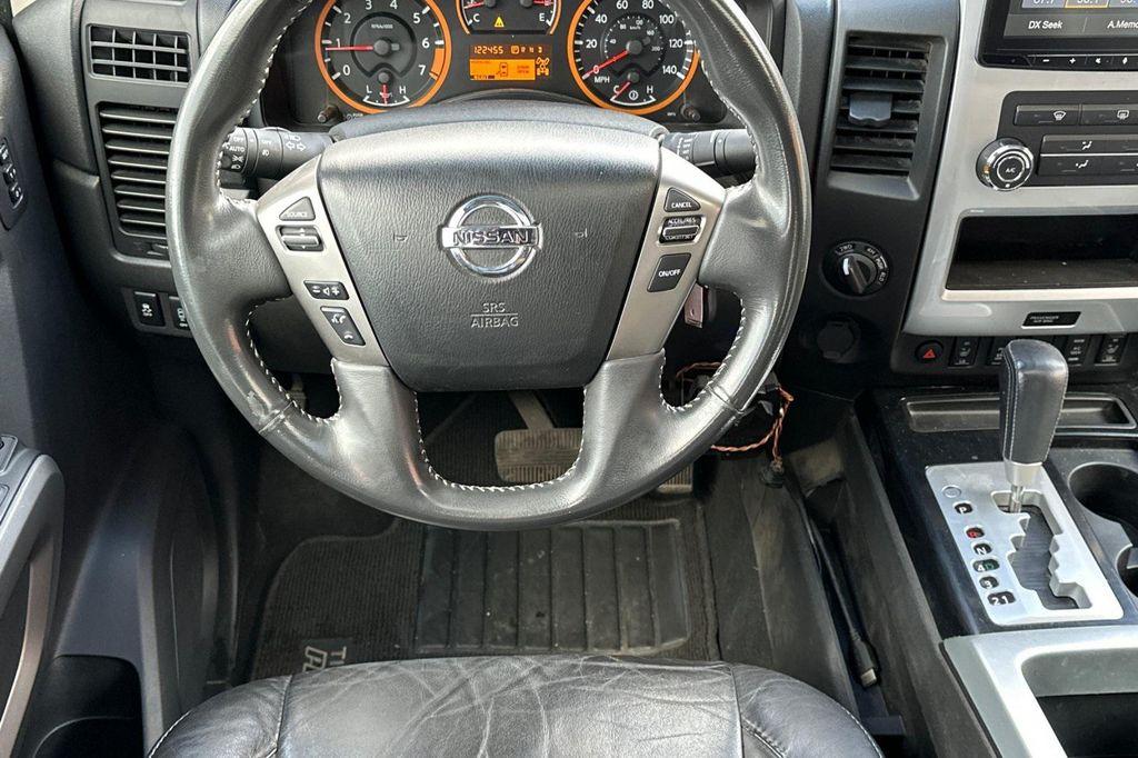 used 2015 Nissan Titan car, priced at $17,900